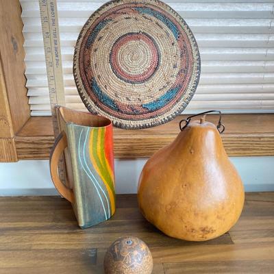 LOT 135X: Collection of Decorative Gourds, Boho Flat Baskets, Wall Art and Kakadu Hand Painted Wooden Scoop