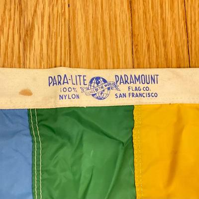 LOT 161X: Pride Collection - "Heart of Mine" Signed Artwork, Para-Lite Paramount Flag Co Outdoor Flag, 3 Towel Set, Stinson...