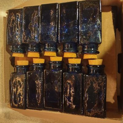 LOT 234: Small Blue Glass Bottles (30)