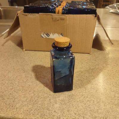 LOT 234: Small Blue Glass Bottles (30)