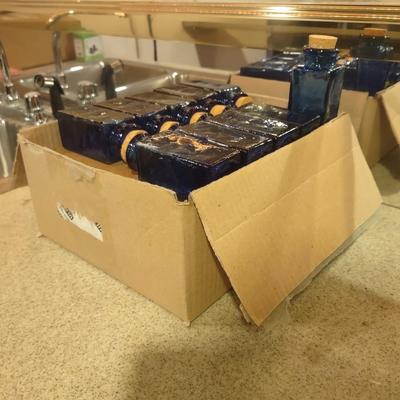 LOT 234: Small Blue Glass Bottles (30)