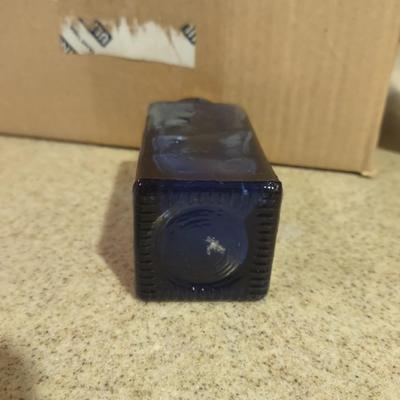 LOT 234: Small Blue Glass Bottles (30)