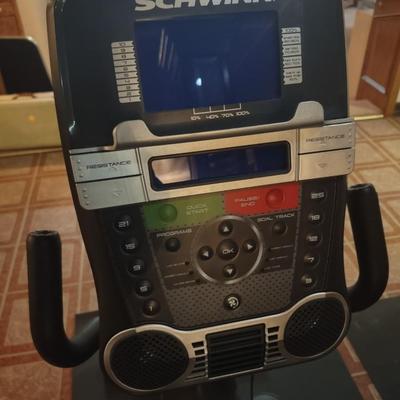 LOT 243: Schwinn Exercise Bike with Floor Mat
