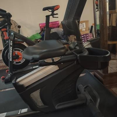 LOT 243: Schwinn Exercise Bike with Floor Mat