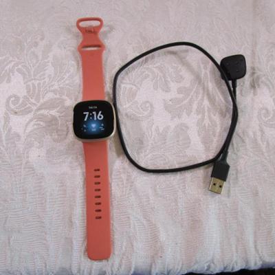Fitbit Versa III smart watch with charger
