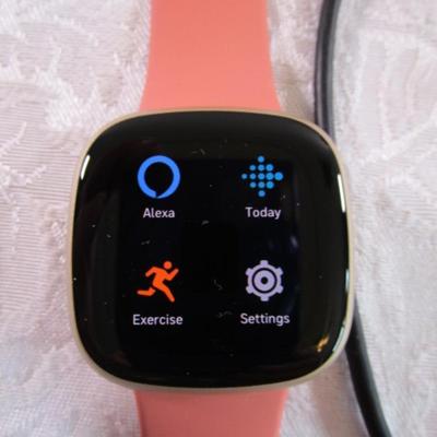 Fitbit Versa III smart watch with charger