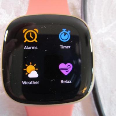 Fitbit Versa III smart watch with charger