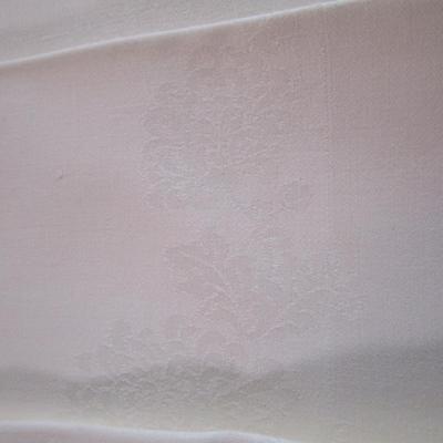 6 off-white cloth napkins (white-on-white pattern)
