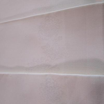 6 off-white cloth napkins (white-on-white pattern)