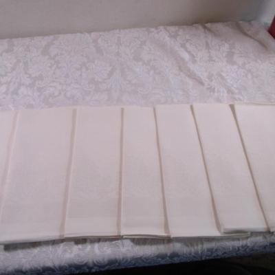 7 White on white floral pattern napkins