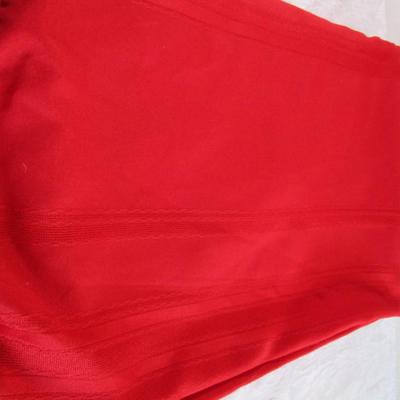 1 red oval linen tablecloth 60" x 102"