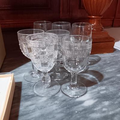 CRYSTAL AND ANTIQUE STEMMED GLASSES, GLASS JEWELS AND A WINE COOLER