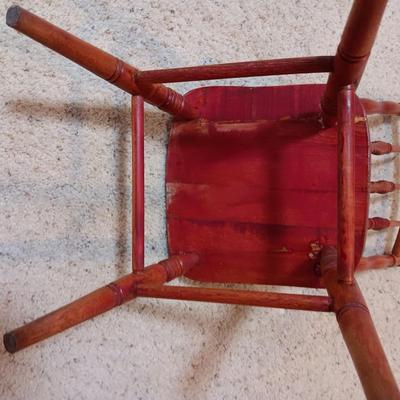 BISQUE HEAD, HANDS AND FEET ANTIQUE DOLL WITH A STURDY CHILD'S CHAIR