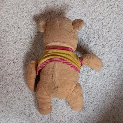 A VERY OLD AND MUCH LOVED WINNIE THE POOH PLUS A PATCHWORK RABBIT