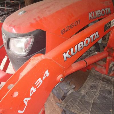 Kubota B2601 Tractor with backhoe. Only 29 hours. Garage Kept.