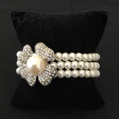 Cute faux pearl, three strand rhinestone flower stretch bracelet