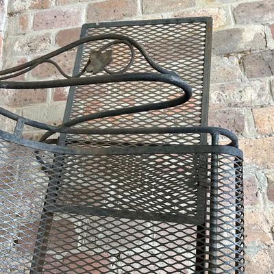 Two Wrought Iron Chairs with Pull Out Tables