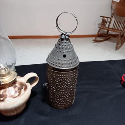 CLAY BASE LANTERN AND A TIN CANDLE LANTERN