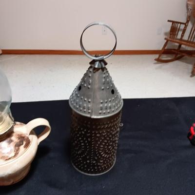 CLAY BASE LANTERN AND A TIN CANDLE LANTERN