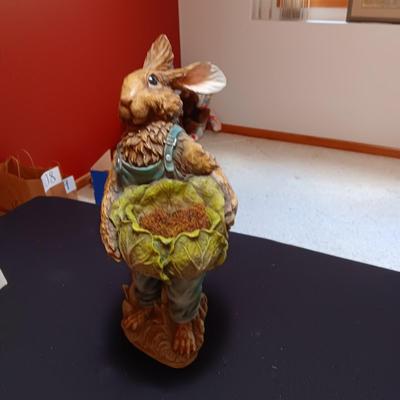 TALL RABBIT HOLDING A BASKET OF EGGS