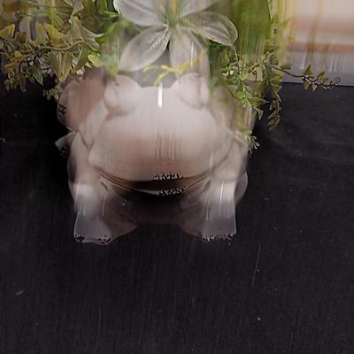 TERRA COTTA FROG W/PLASTIC LILIES AND A CERAMIC LACED BOWL