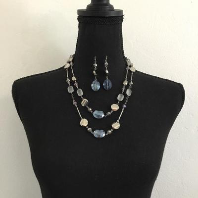 Beautiful light blue, iridescent, sausage, double strand, glass, bead fashion, necklace with matching dangling earrings