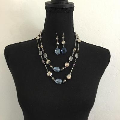 Beautiful light blue, iridescent, sausage, double strand, glass, bead fashion, necklace with matching dangling earrings