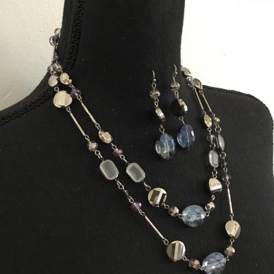 Beautiful light blue, iridescent, sausage, double strand, glass, bead fashion, necklace with matching dangling earrings