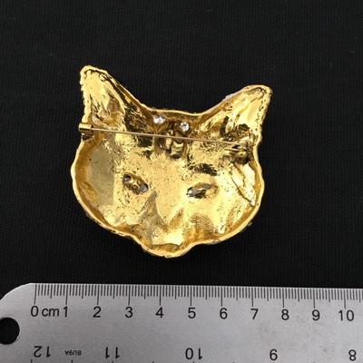 Super cool, enameled rhinestone masquerade cat brooch