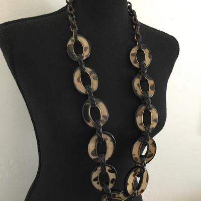 Chicos, large acrylic, leopard chain-link, and leather statement necklace