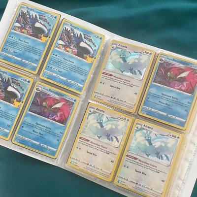 Binder of 100 Pokemon Cards, many Holos