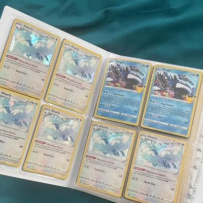 Binder of 100 Pokemon Cards, many Holos