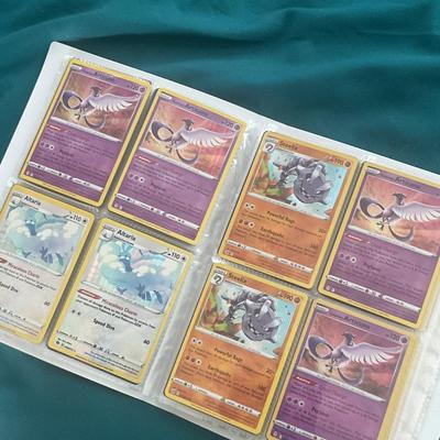 Binder of 100 Pokemon Cards, many Holos