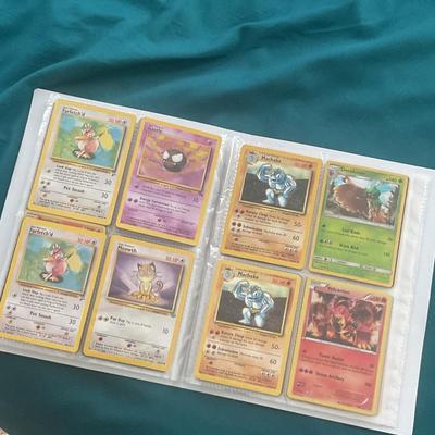 Binder of 100 Pokemon Cards, many Holos