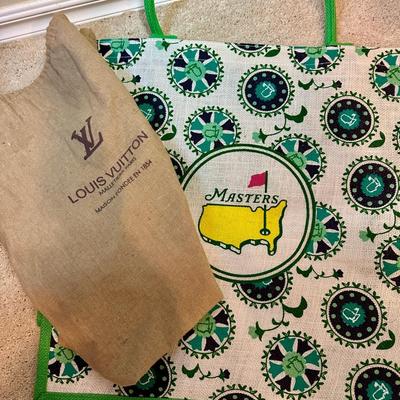 Master Bedroom closet - Master's Tote & Louis Vuitton Dust cover
