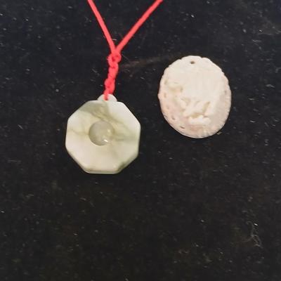 Lucky fortune Octagon Bagua white jade necklace and a carved pink stone pendant year of the bull