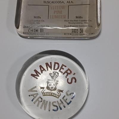 Two antique glass advertising paperweights - Deal Saw Mills Co. Inc. Tuscaloosa Ala. and Mander's Varnishes - glass paperweights