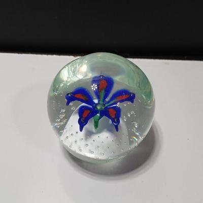 Signed glass paperweight with blue and red flower - beautiful glass paperweight