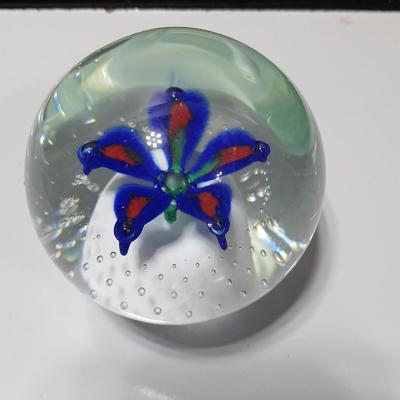 Signed glass paperweight with blue and red flower - beautiful glass paperweight