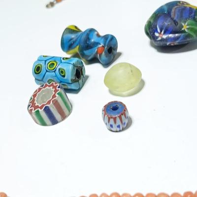 Beautiful colorful authentic trade beads and a beaded necklace