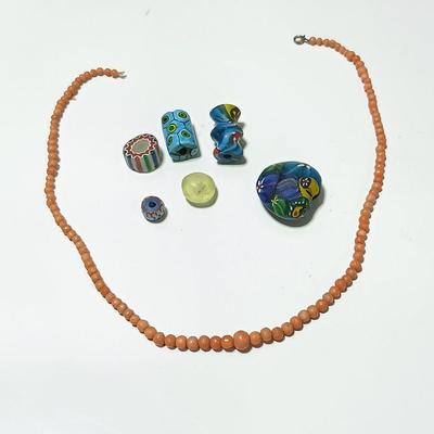 Beautiful colorful authentic trade beads and a beaded necklace
