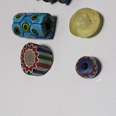 Beautiful colorful authentic trade beads and a beaded necklace