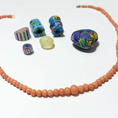 Beautiful colorful authentic trade beads and a beaded necklace