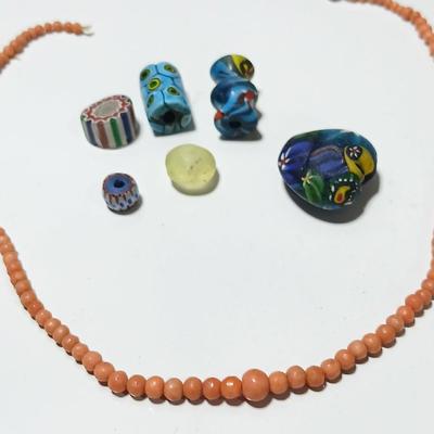 Beautiful colorful authentic trade beads and a beaded necklace