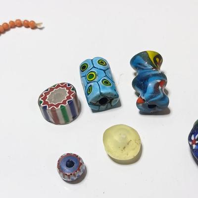 Beautiful colorful authentic trade beads and a beaded necklace