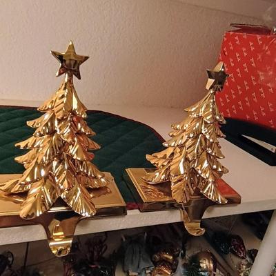 4 WEIGHTED BRASS CHRISTMAS STOCKING HOLDERS