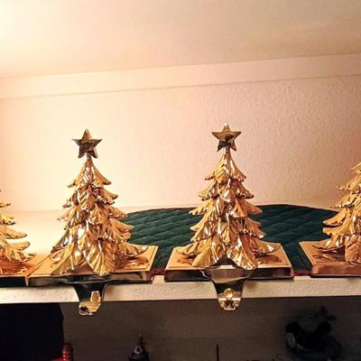 4 WEIGHTED BRASS CHRISTMAS STOCKING HOLDERS