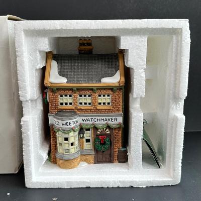 LOT 3K: Department 56 Heritage Village Collection Dickens Village Series - White Horse Bakery, Geo Weston Watchmaker & Cobles Police...