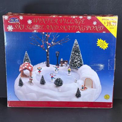 LOT 34K: Animated Singing Dog Trio, Very Merry Mice & Winter Village Ski Slope & Skating Pond