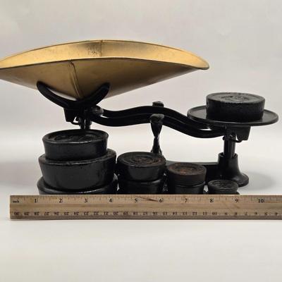 LOT 88B: Vintage Balance Scale with Iron Weights and Brass Holder, Antique Honing Stone, Stone Rolling Pin, and Scoop Master Ice Cream Scoop